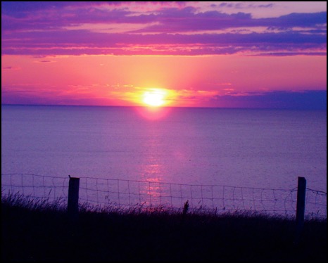 A beautiful, colourful sunsetrd  at Cape Tryon Lighthouse, Prince Edward Island (PEI)